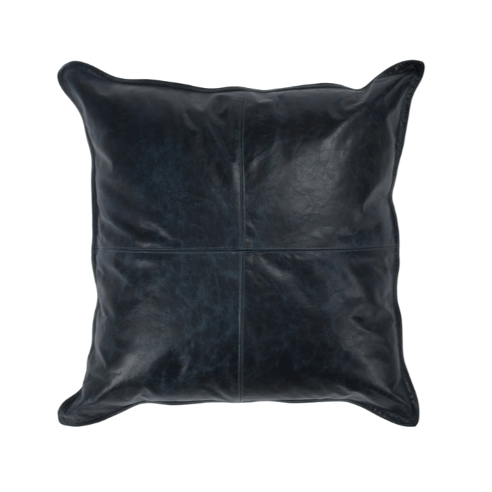 Black leather pillow on a white background