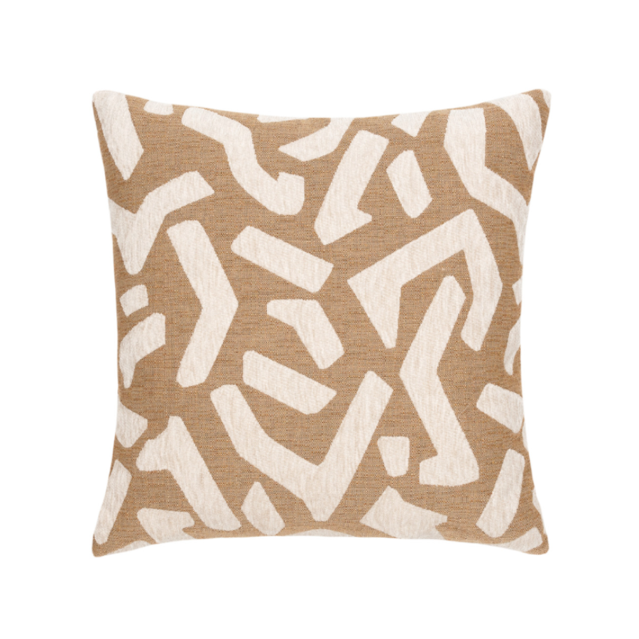 Decorative pillow with abstract pattern on a beige background