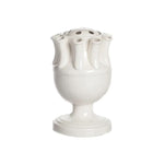 A white ceramic tulip-shaped vase with a removable top, standing on a solid background.