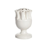 A white ceramic tulip-shaped vase with a removable top, standing on a solid background.