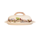 Decorative fall/autumn ceramic butter dish with lid on a white background