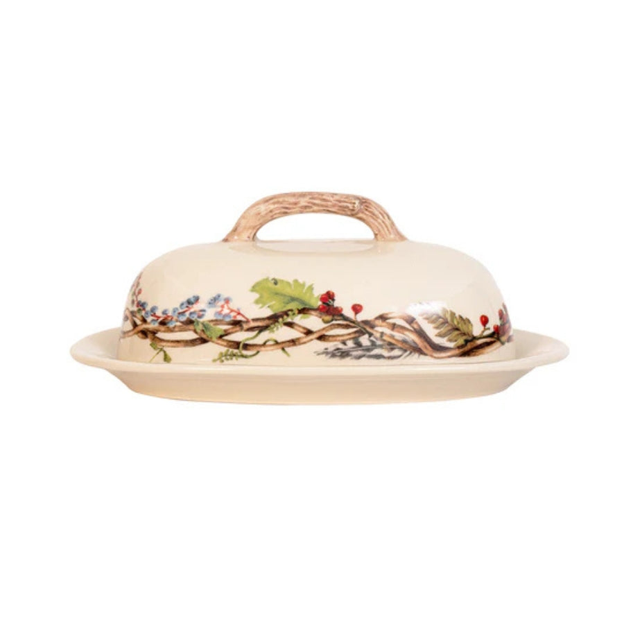 Decorative fall/autumn ceramic butter dish with lid on a white background