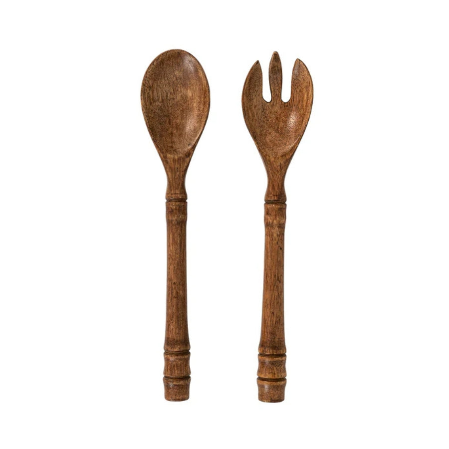 Wooden spoon and fork set on a white background