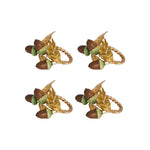 Set of four acorn-shaped hair accessories on a white background