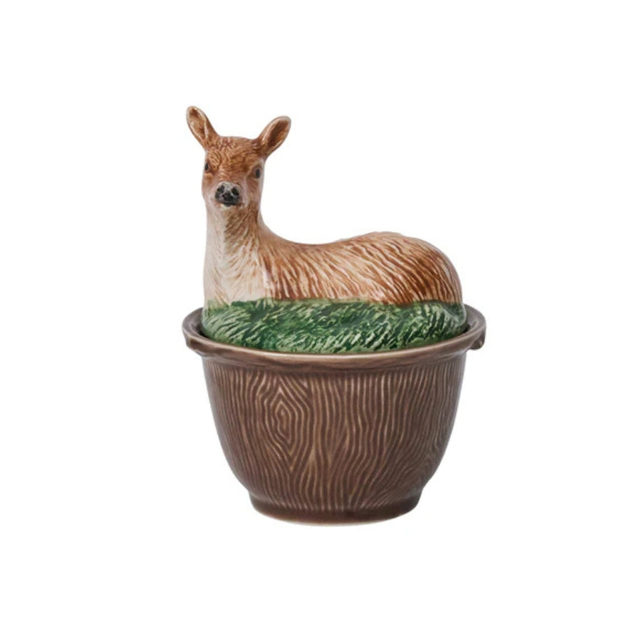 Deer-shaped container with a grassy base on a white background