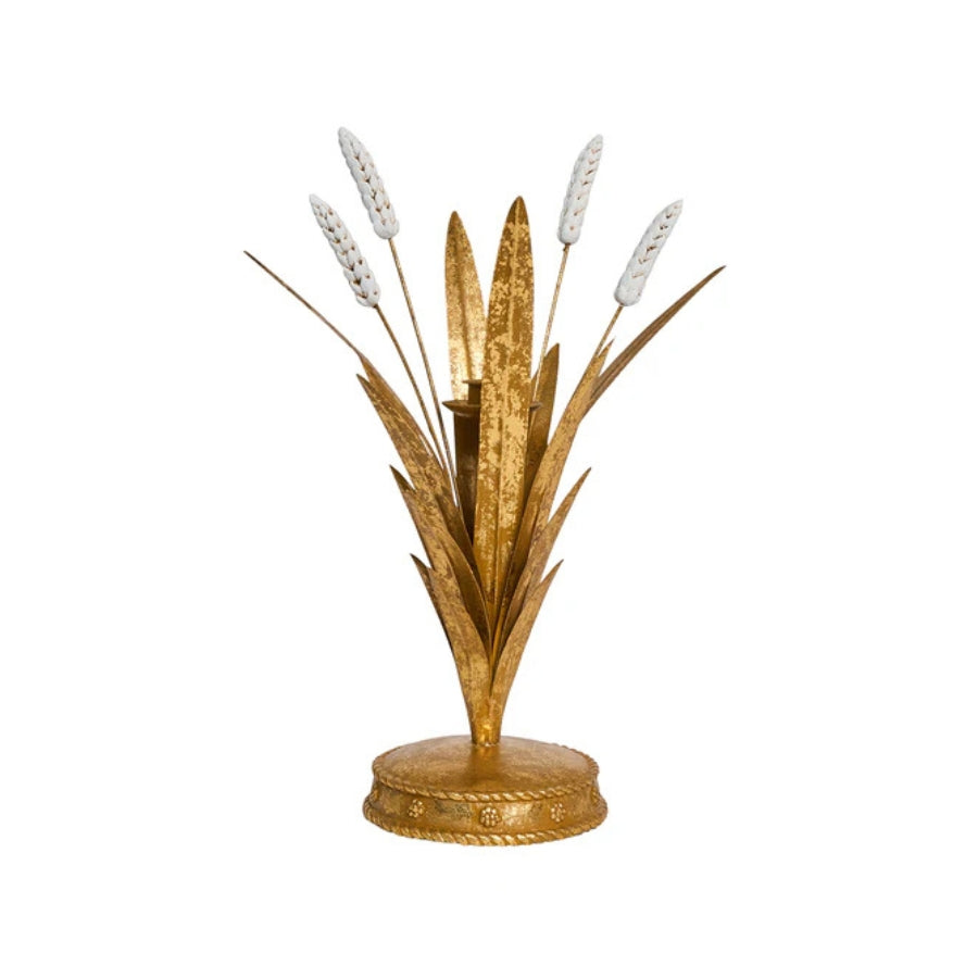 Decorative gold plant sculpture with white flowers on a white background