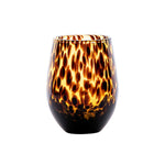 Tortoiseshell patterned glass on a white background
