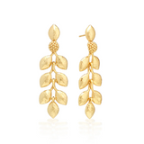 Pair of gold leaf-shaped earrings on a white background