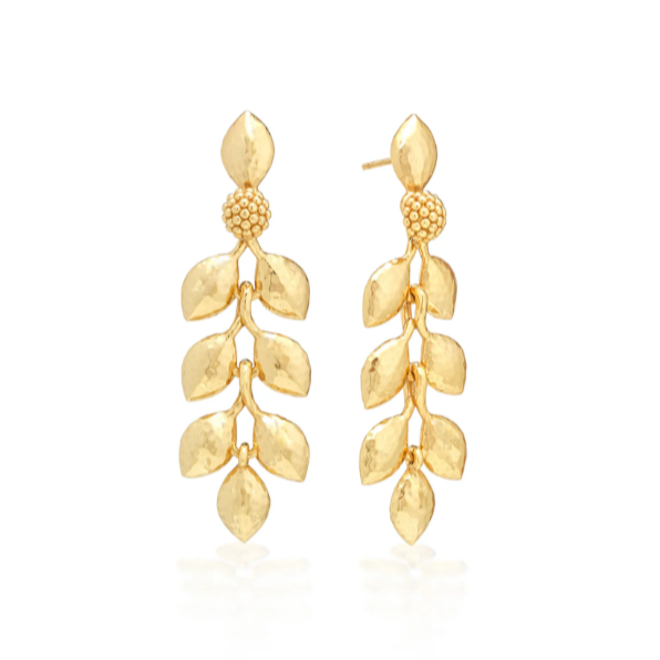 Pair of gold leaf-shaped earrings on a white background