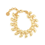Gold bracelet with leaf design on a white background