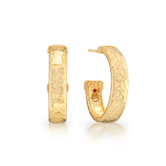 Gold hoop earrings on a white background