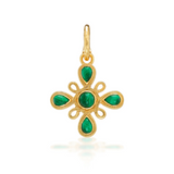 Gold pendant with green gemstones on a white background