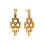 Gold geometric earrings on a white background