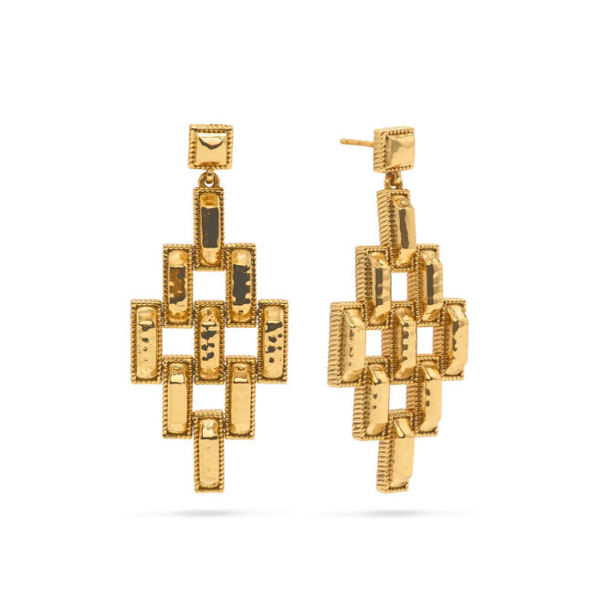 Gold geometric earrings on a white background