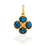 Gold pendant with blue stones on a white background