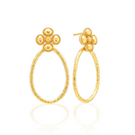 Gold hoop earrings with floral tops on a white background