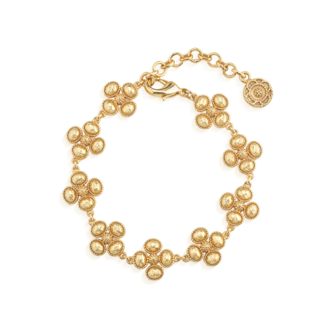 Gold bracelet with a clasp on a white background