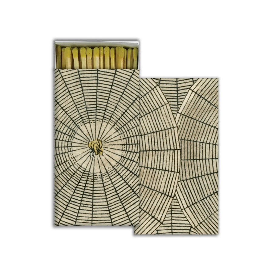 Matches with halloween decorative packaging on a white background